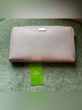 kate spade metallic rose gold zip-around continental wallet